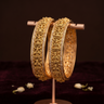 Gold Plated Lakshmi Temple Bangle with White AD Stone